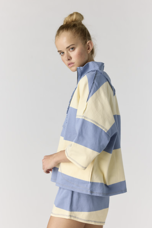 woman wearing matching stripe set on white background