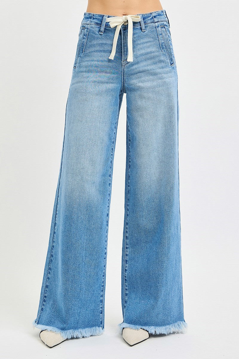 Light blue denim wide-leg jeans with a drawstring waist on a white background