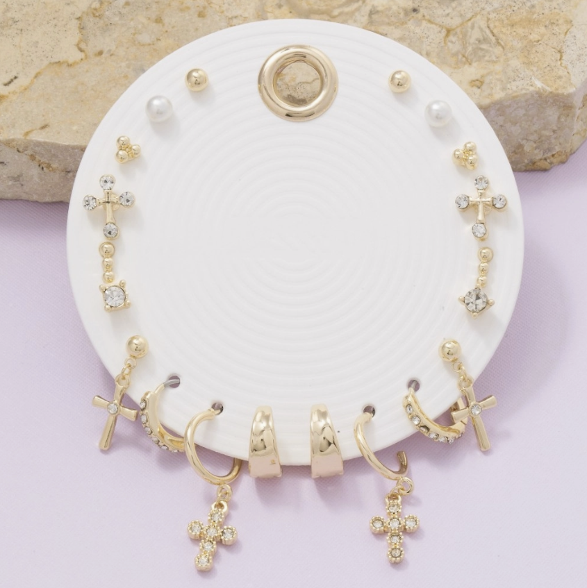 Earring stack on white circle 