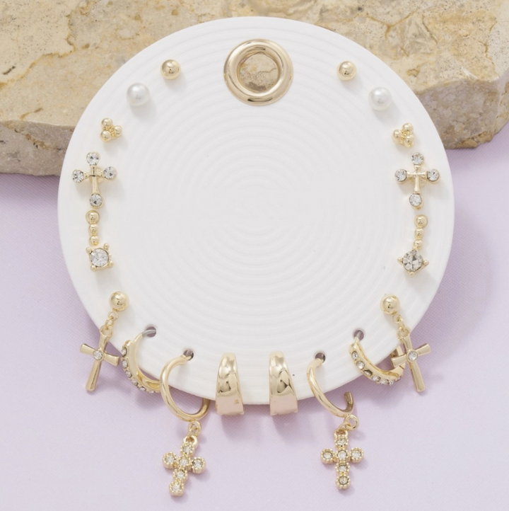 Earring stack on white circle 