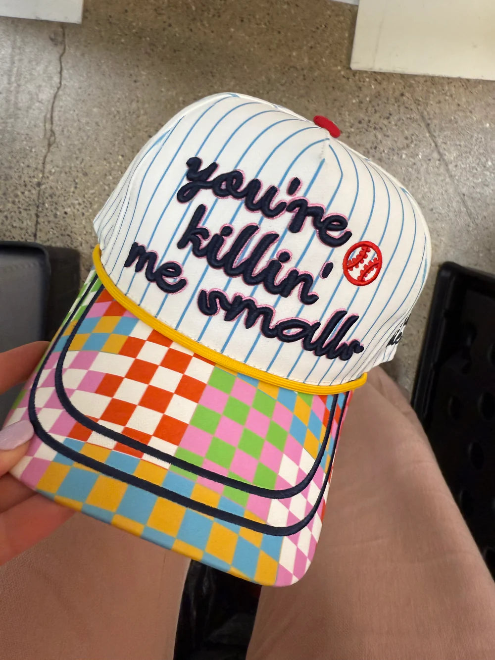 Baseball cap with saying 'you're killin me smalls' and retro colored bill 