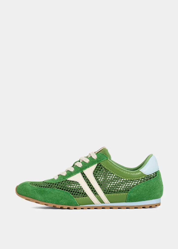 Green sneaker with white accents on a light gray background