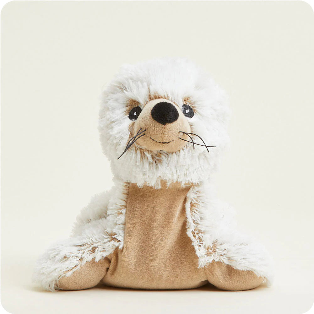 seal plush toy on plain background