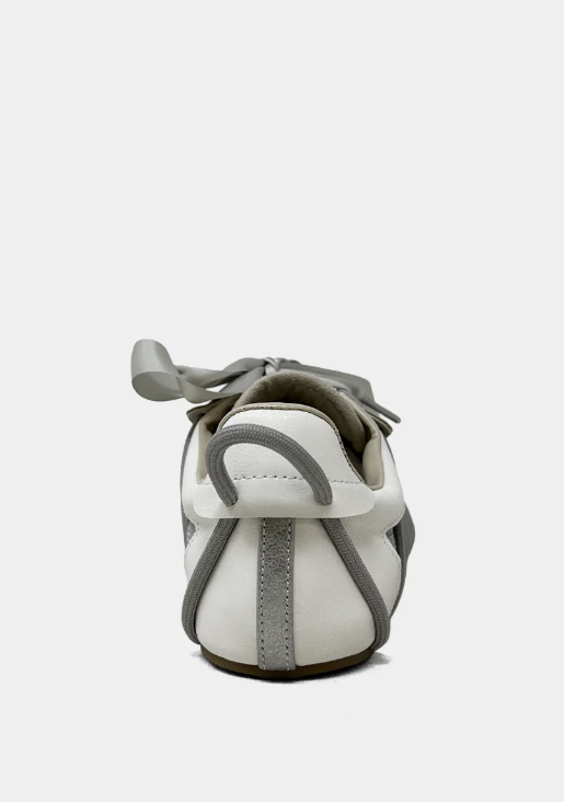 White and gray sneaker on a white background