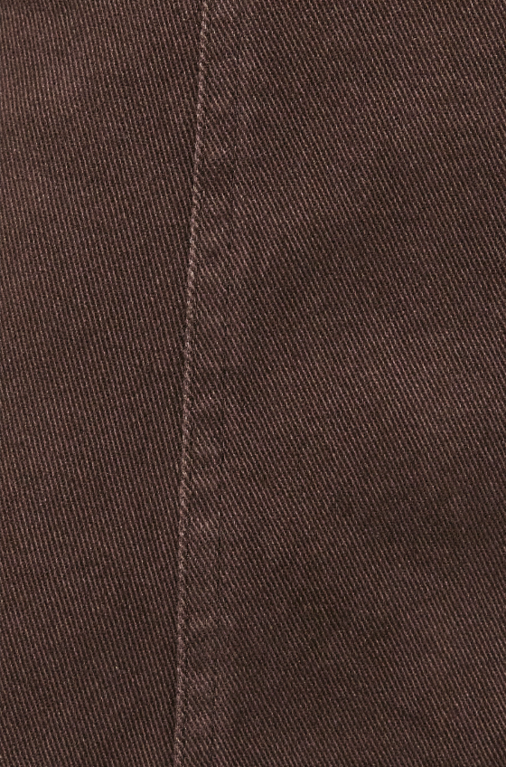 A close-up of dark brown textured fabric with a vertical seam running down the center.