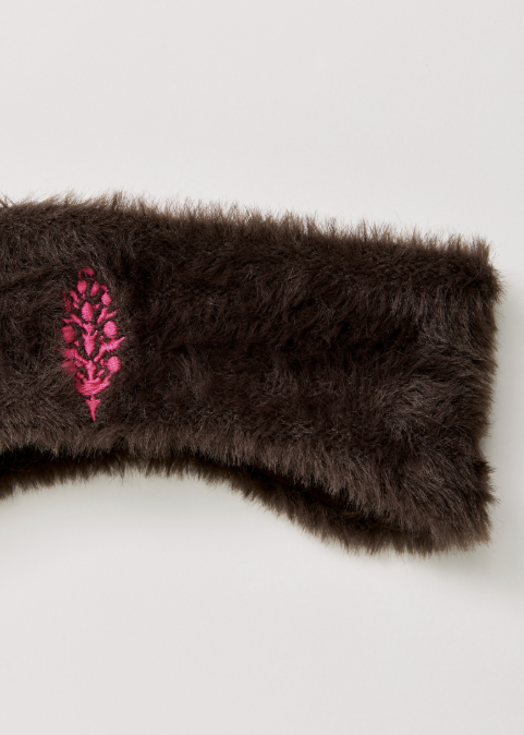 Brown sherpa headband with pink logo on white background