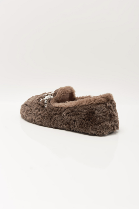 A single brown faux fur slipper with a small silver rhinestone embellishment on the side, shown from a side profile against a clean white background.
