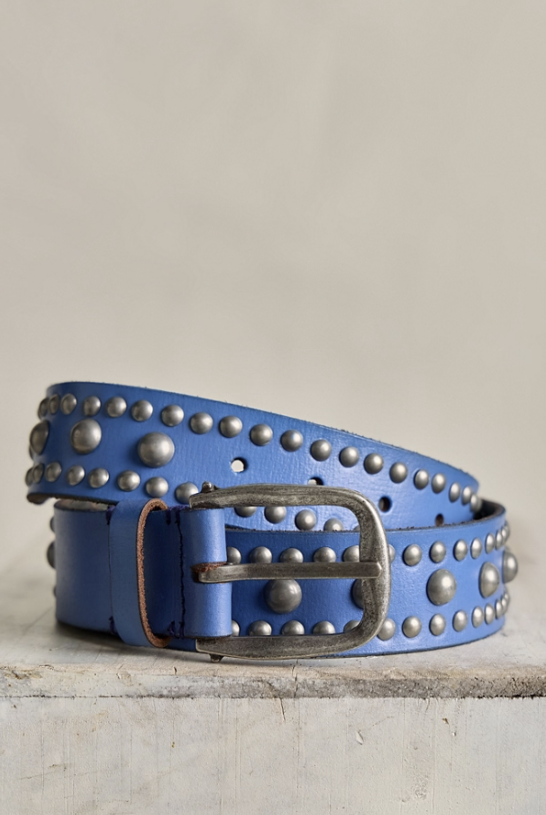 Blue leather belt with silver studs on a light gray background