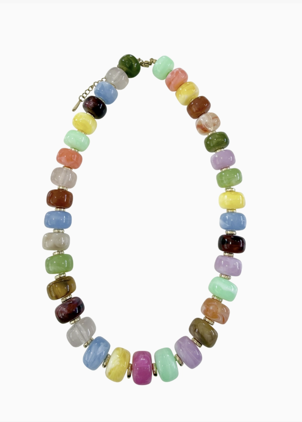 Multi colored beaded necklace on white background