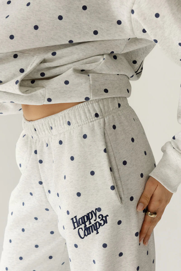 Gray sweatshirt with navy polka dots and matching pants with &