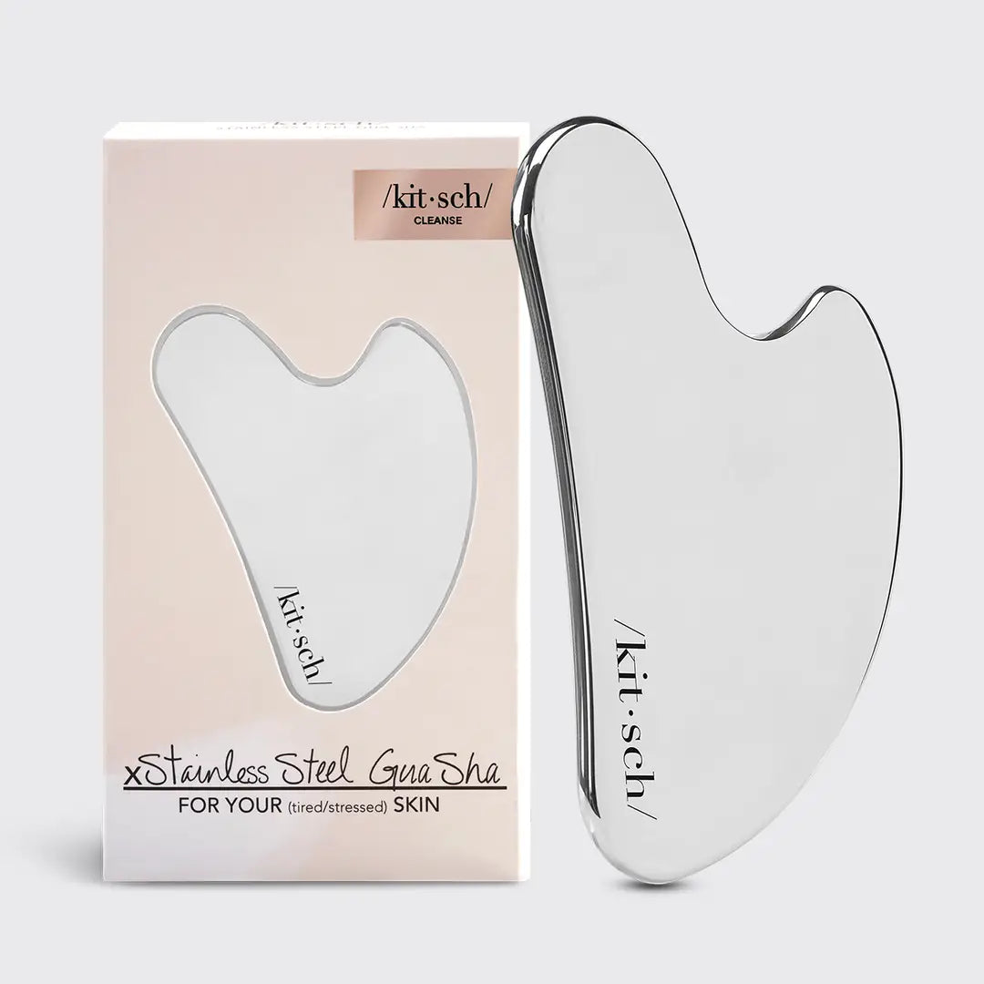 Stainless Steel Gua Sha in packaging on plain background