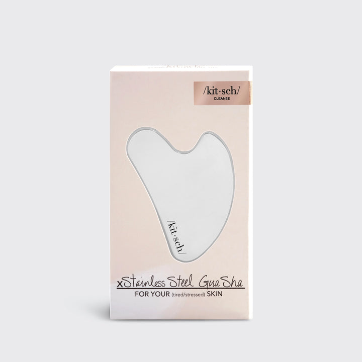 Stainless Steel Gua Sha in packaging on plain background