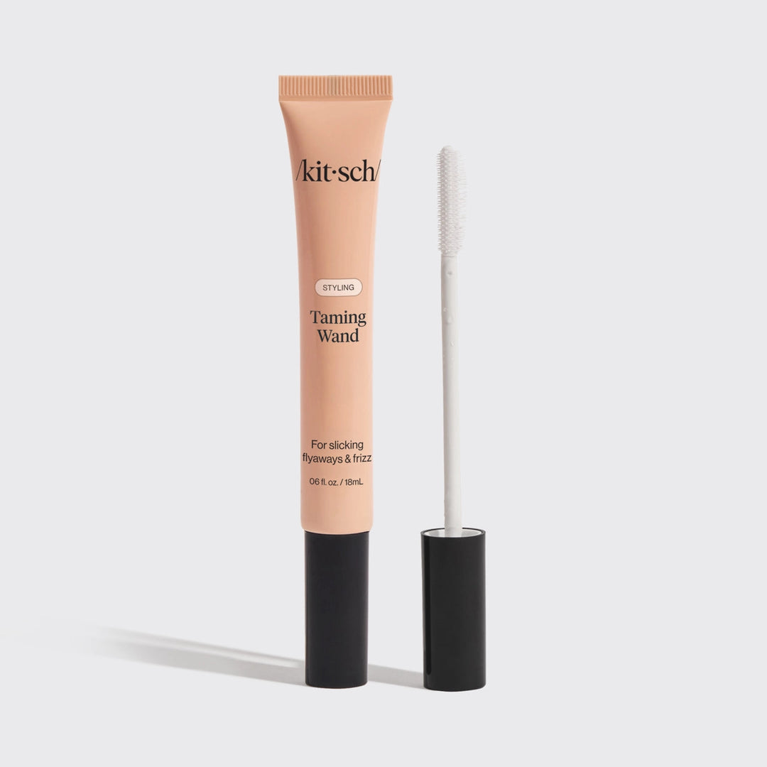 Kitsch styling taming wand on plain background