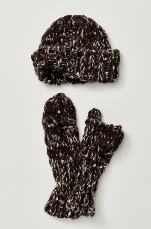 A dark brown chunky knit beanie hat and matching fingerless mittens with speckled multicolor flecks, laid flat on a light gray background.