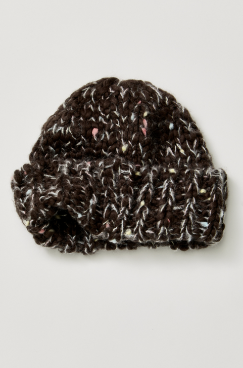 A dark brown chunky knit beanie hat with white, pink, and light blue yarn flecks, shown on a light gray background.