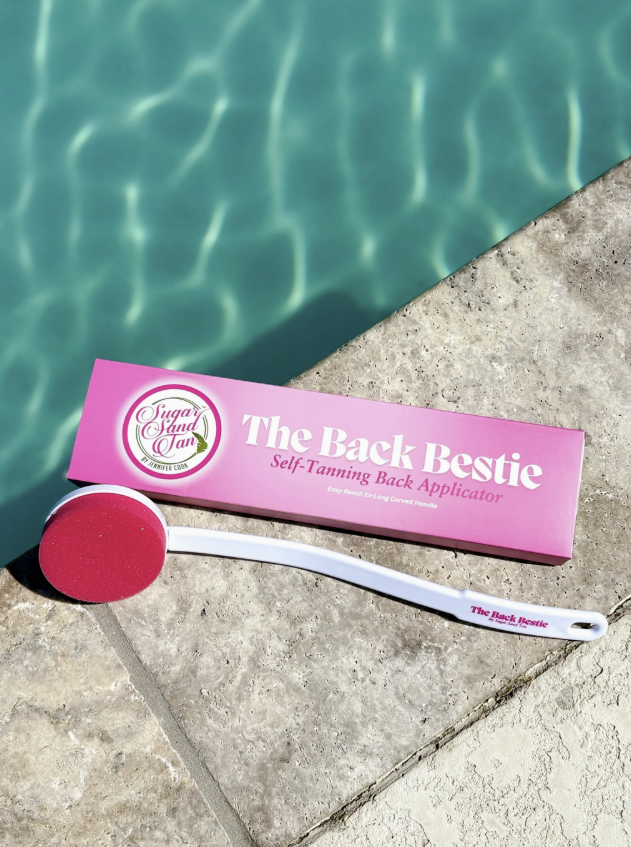 Self tanning applicator displayed by pool
