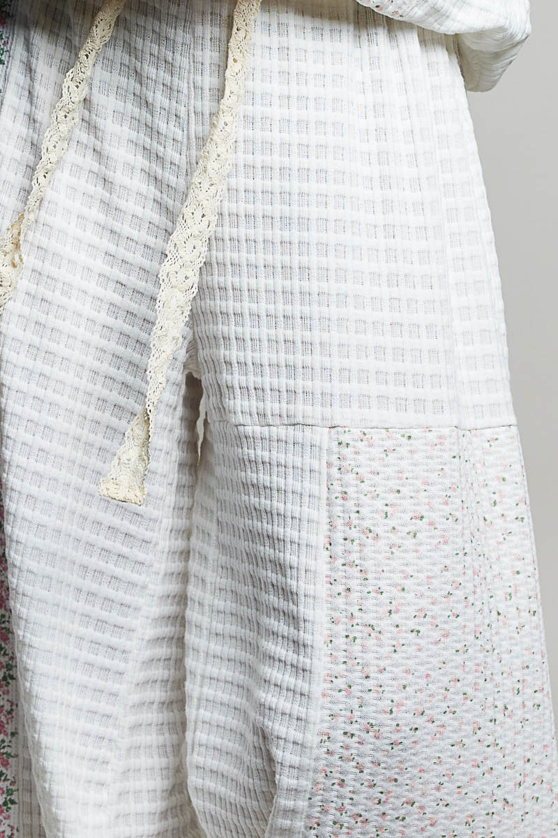 close up of white waffle knit pants