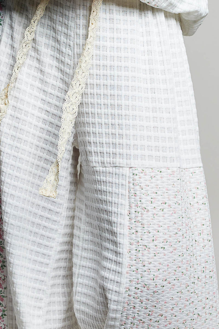 close up of white waffle knit pants