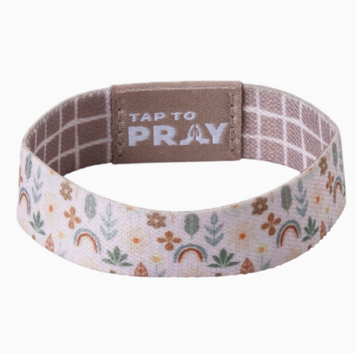 Tap to pray bracelet with symbols and plaid on white background