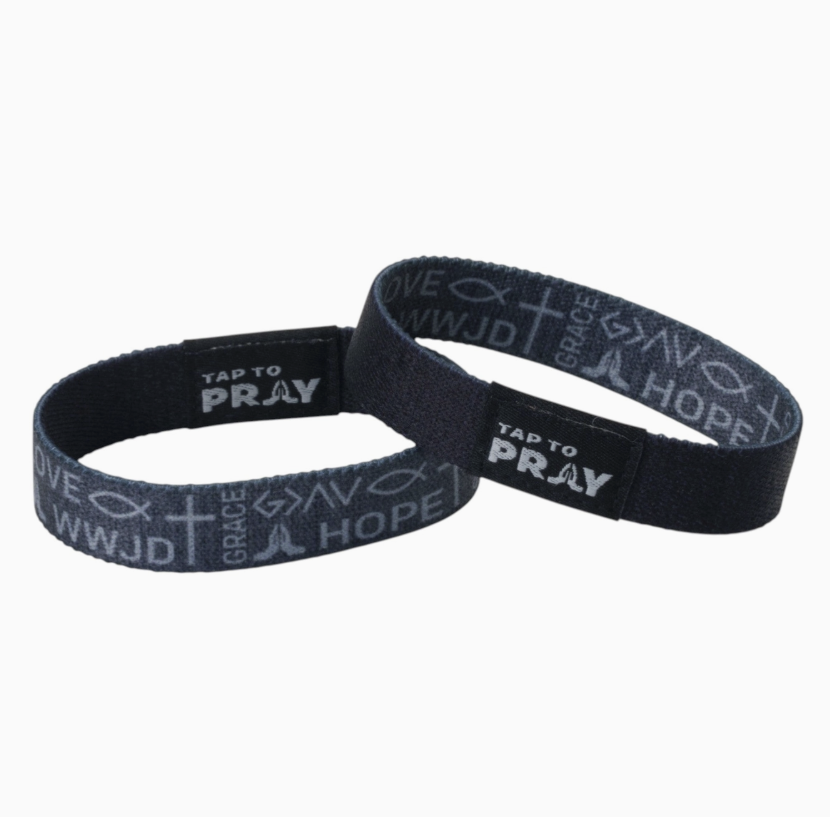 Two tap to pray bracelets featuring one side of black and one side of faith symbols on white background.