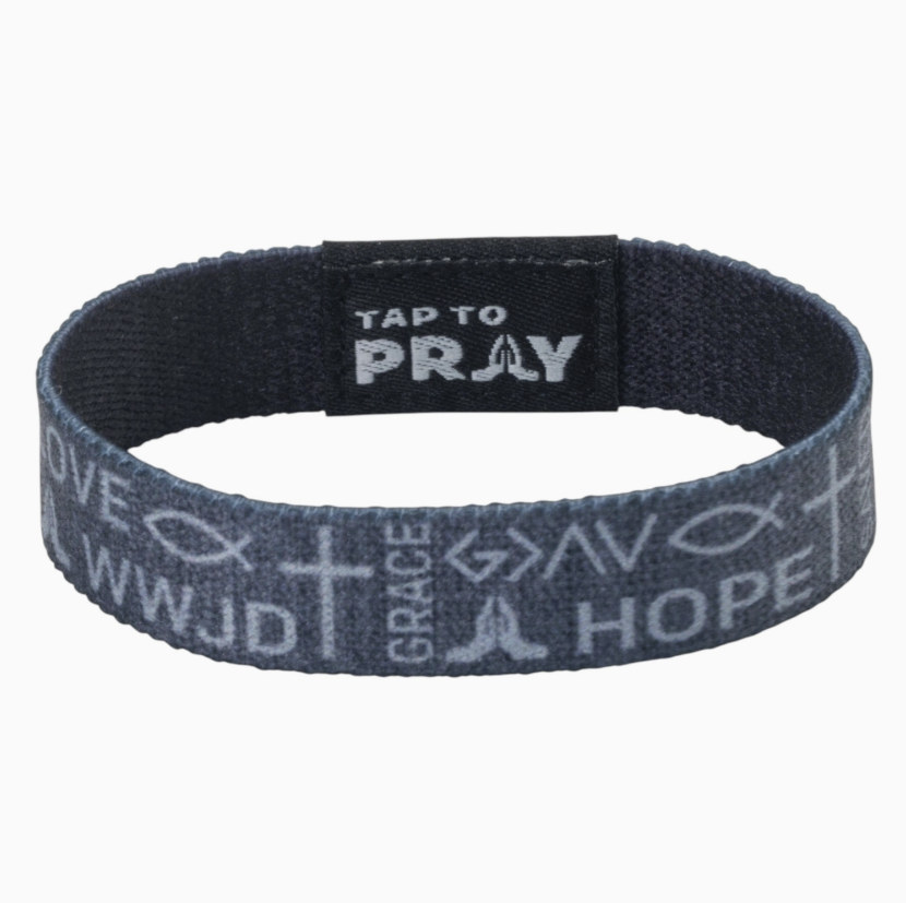 A dark gray fabric wristband with a black inner strap that reads &