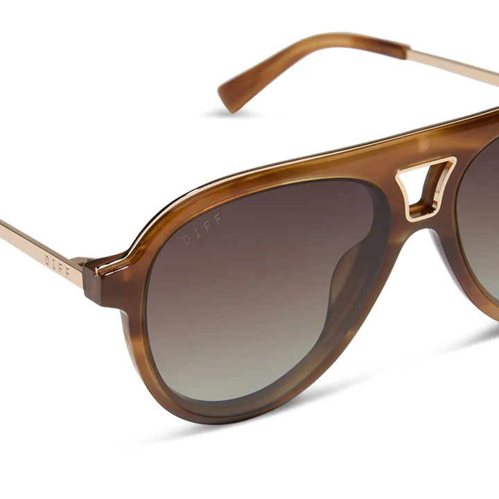 Brown sunglasses with a gradient lens on a white background