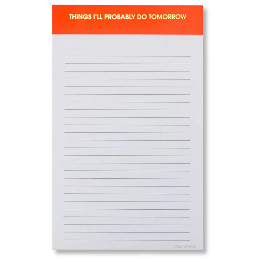 notepad with orange top on white background