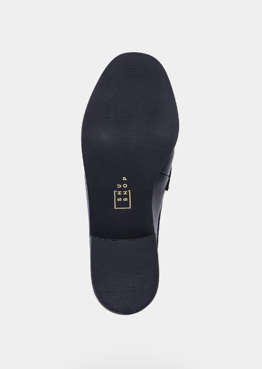 Top-down view of a dark navy blue shoe sole showing size markings (39, 40, 41, 42, 43) on a light gray background.