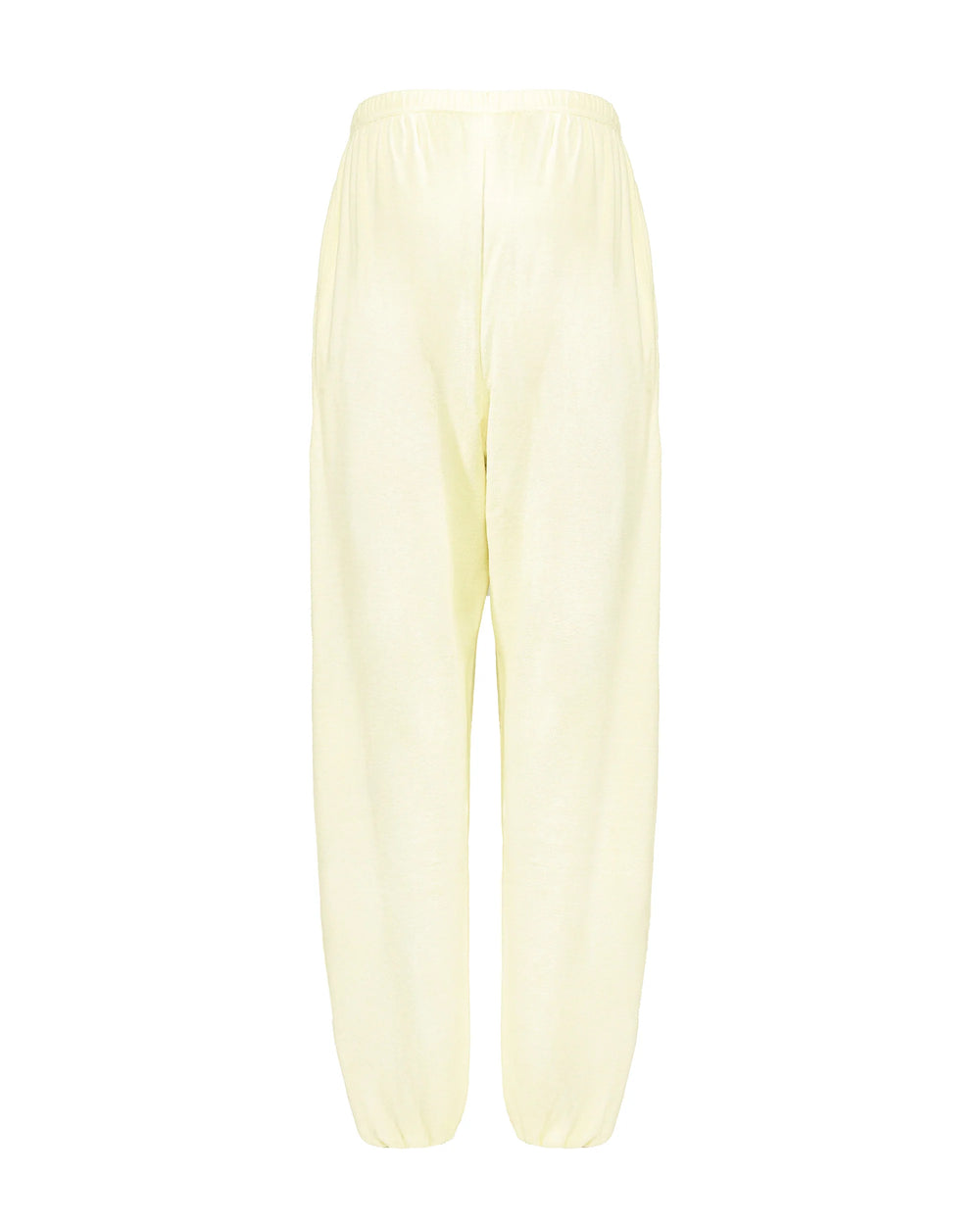 Butter yellow jogger pans on plain background
