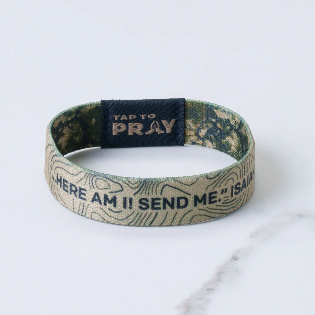 Wristband with text and prayer invocation on a white background