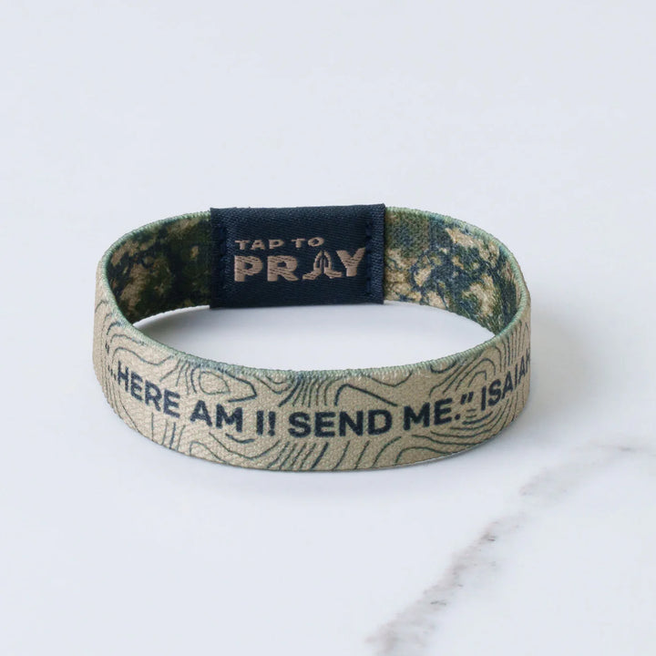 Wristband with text and prayer invocation on a white background