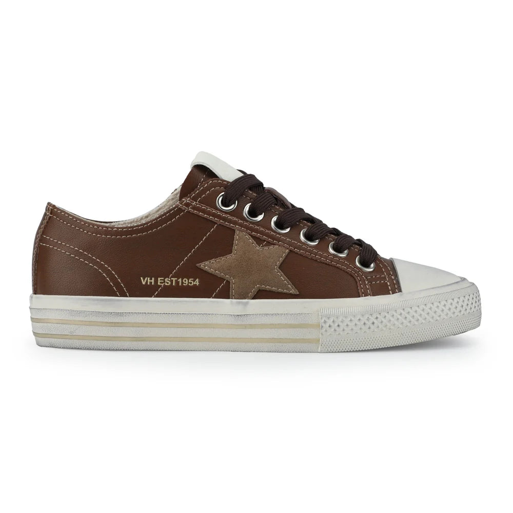 Brown sneaker with star design on a white background