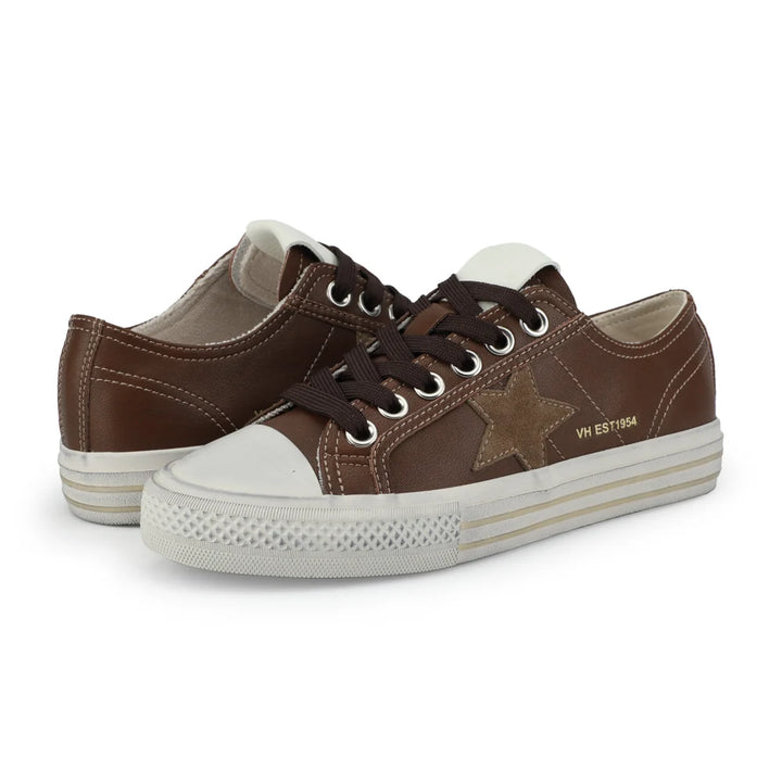 Brown sneakers with a star design on a white background