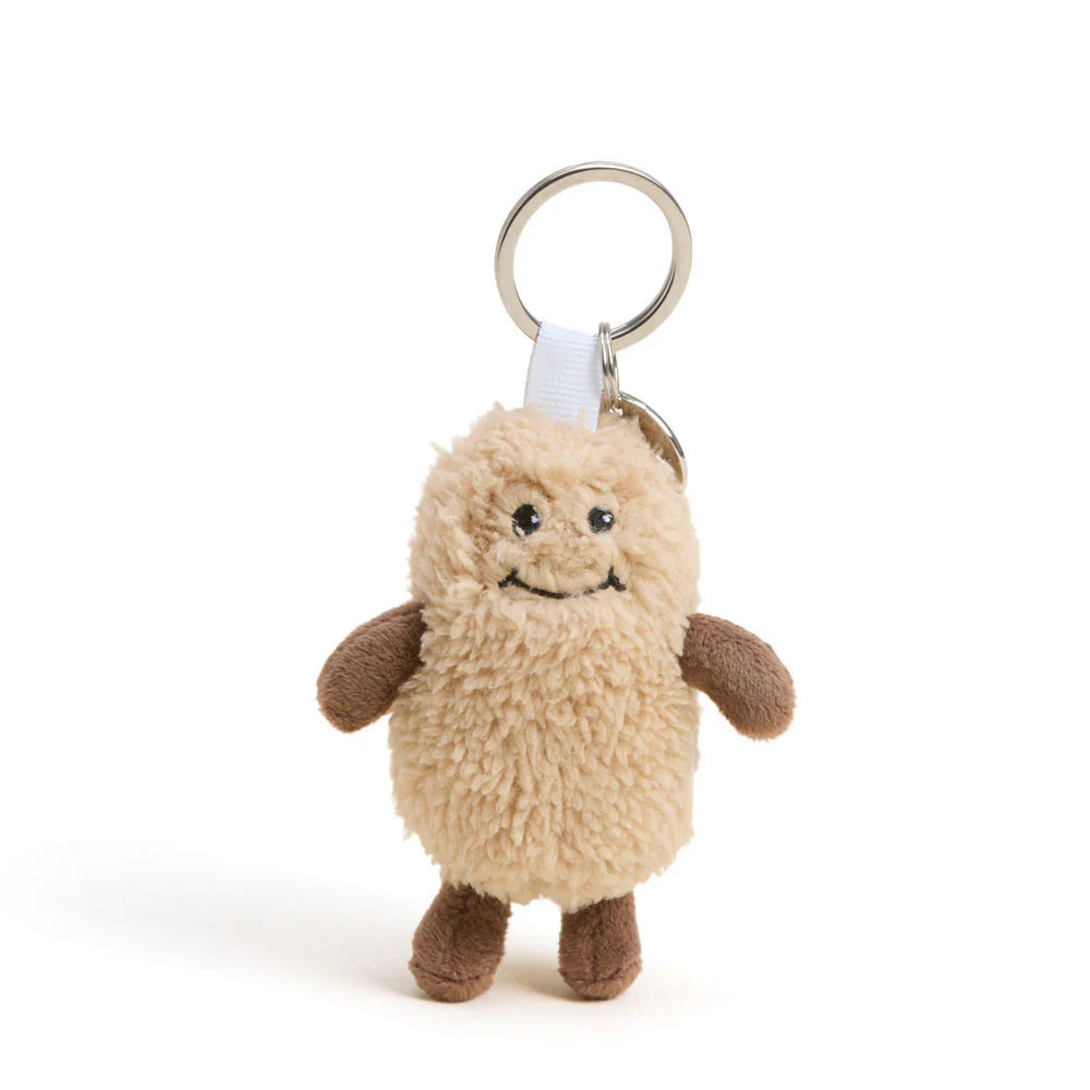 Keychain with stuffed peanut on white background