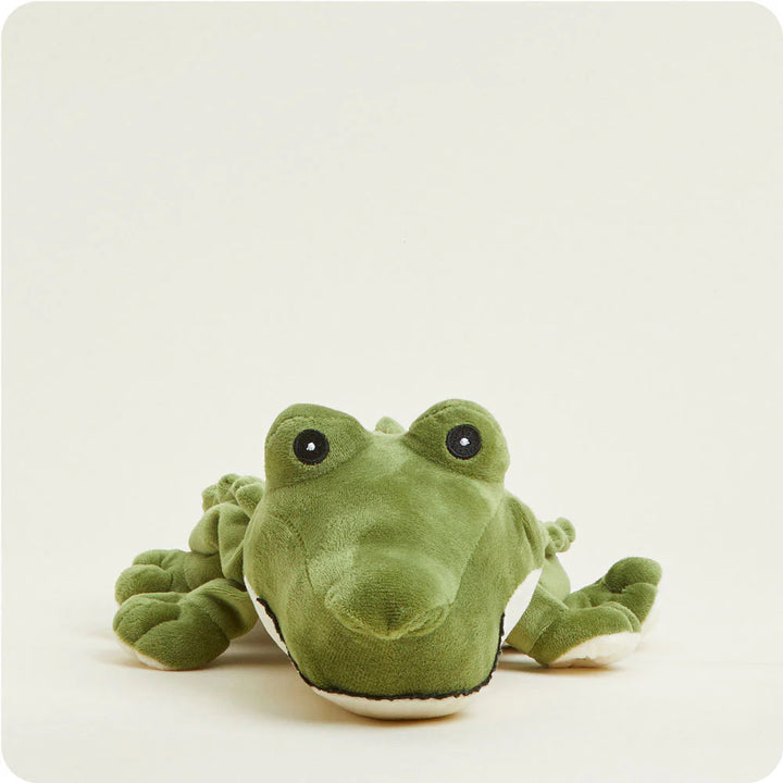 alligator plush toy on plain background