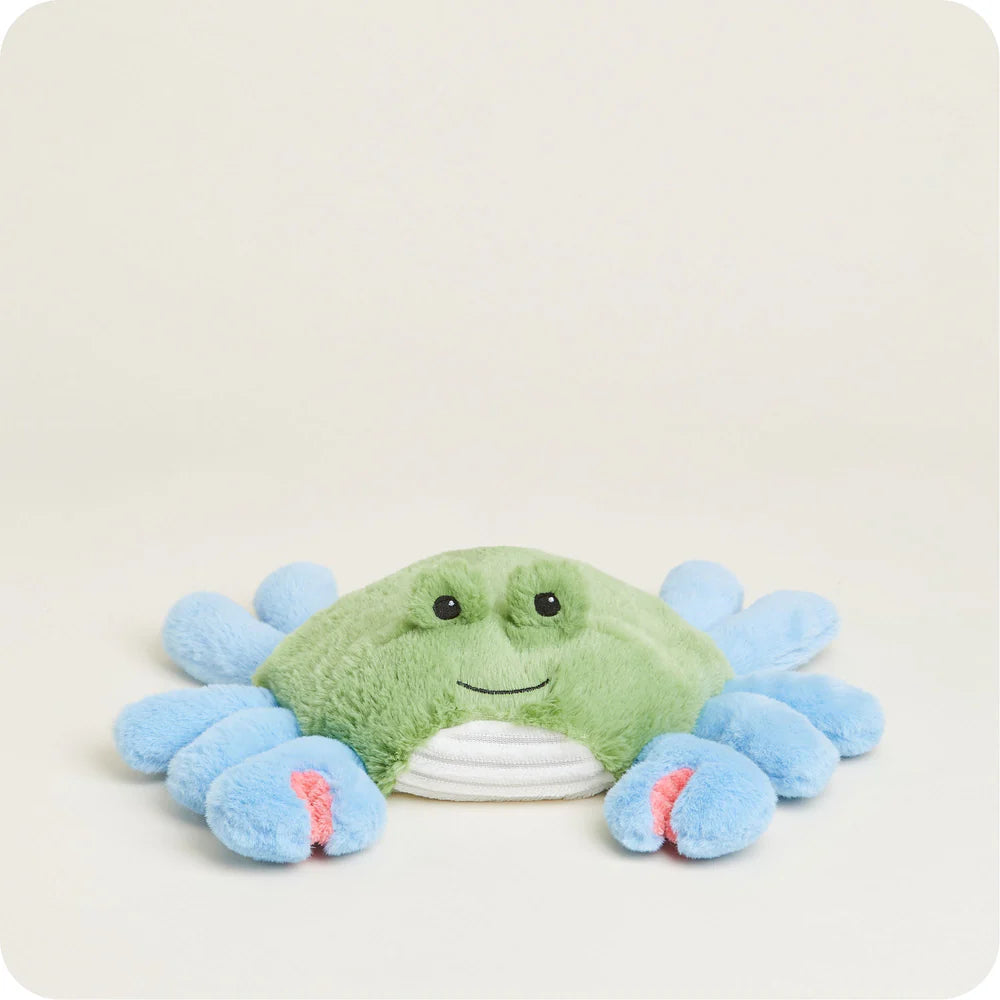 plush crab toy on plain background