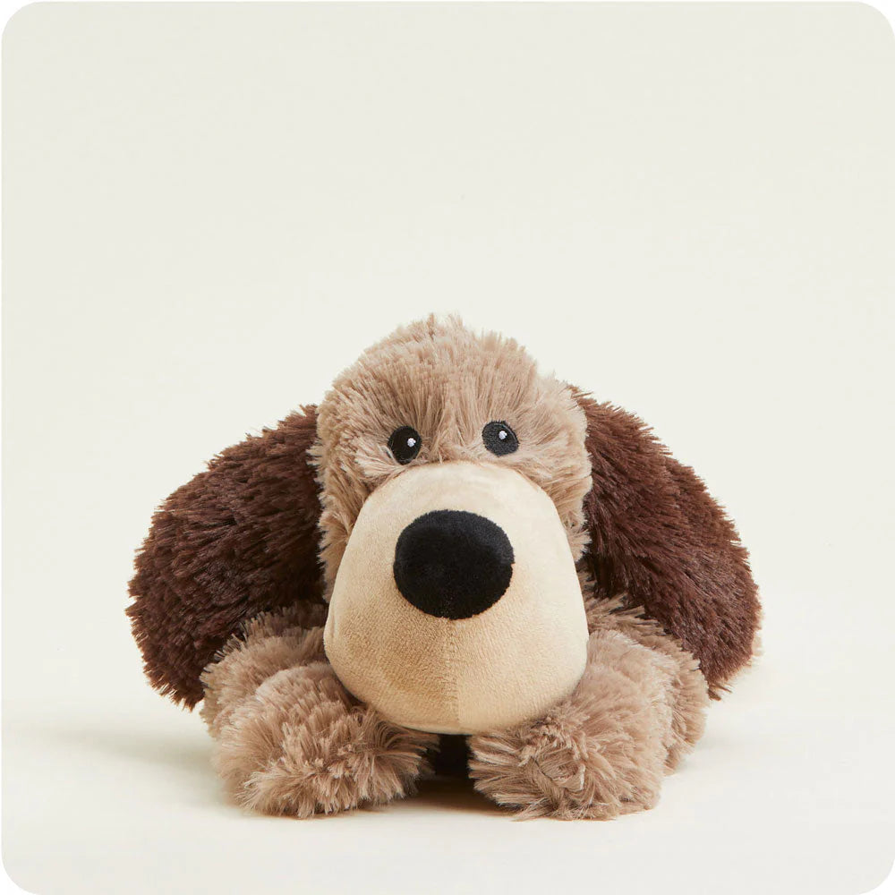 Plush dog toy with brown and beige fur on a white background