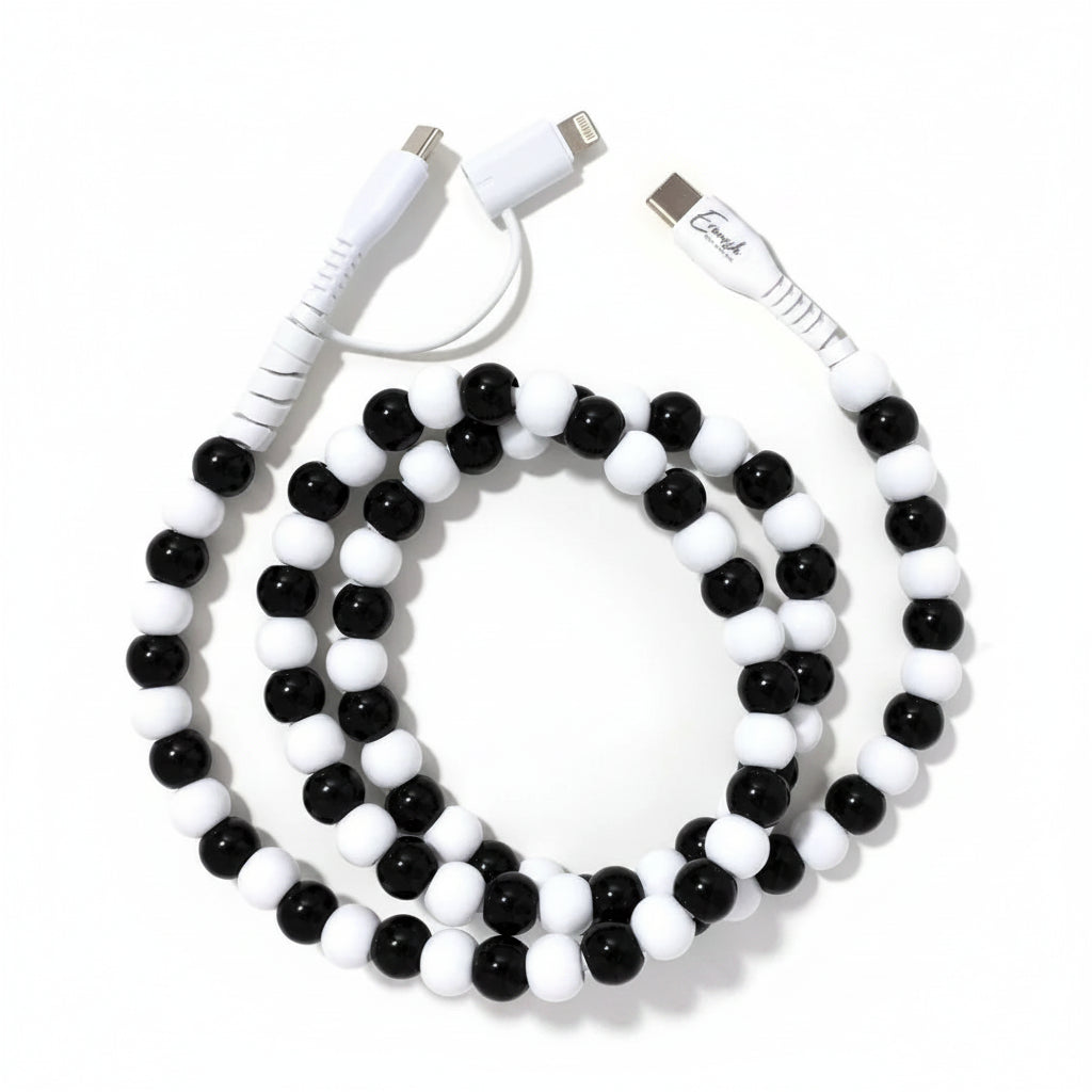 Black and white beaded cable with USB connectors on a white background