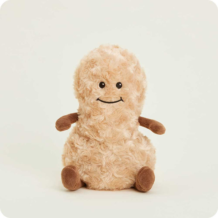 plush peanut toy with smiling face on white background