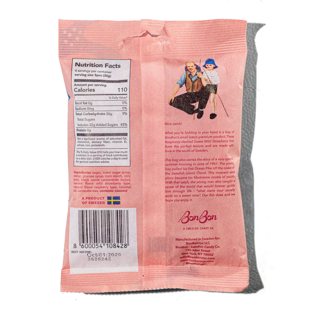 Back of a pink candy package with text and a barcode on a white background