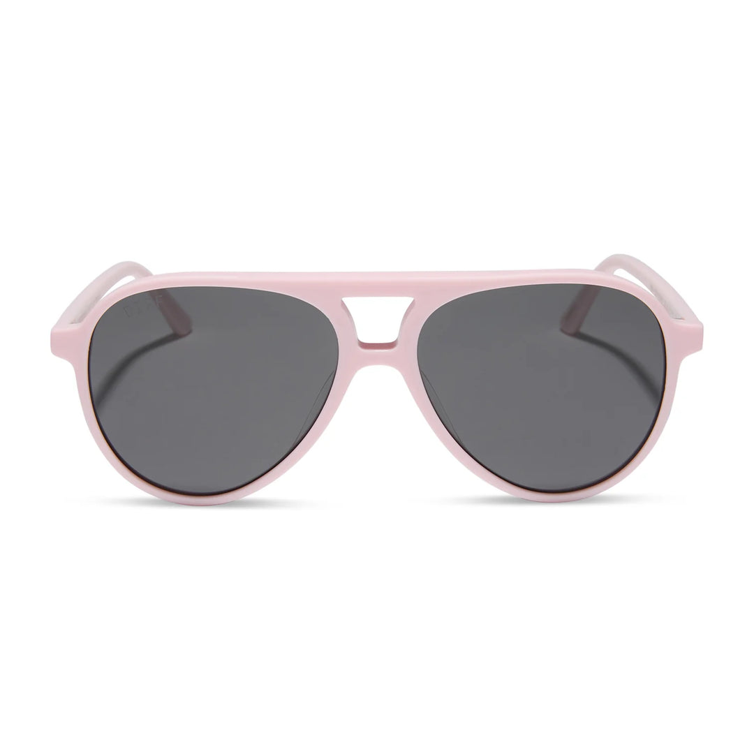 Pink sunglasses with dark lenses on a white background