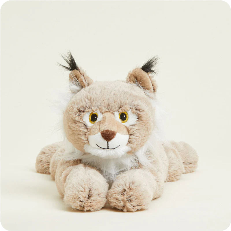 Plush toy lynx on a white background