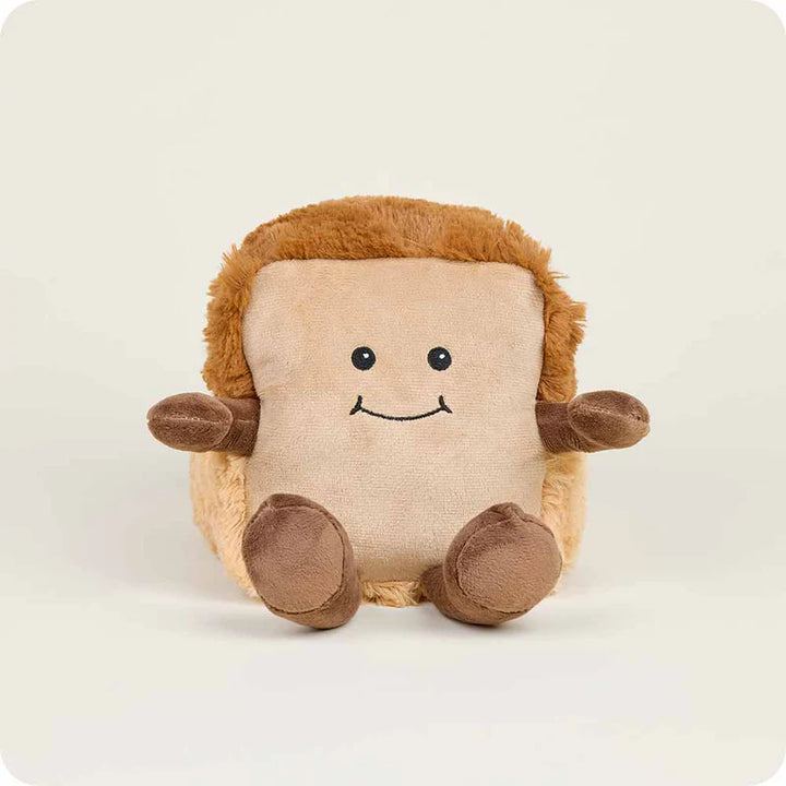 A plush toy shaped like a square character with a beige face and body, brown fuzzy hair, and brown arms and legs, sitting against a plain light background.